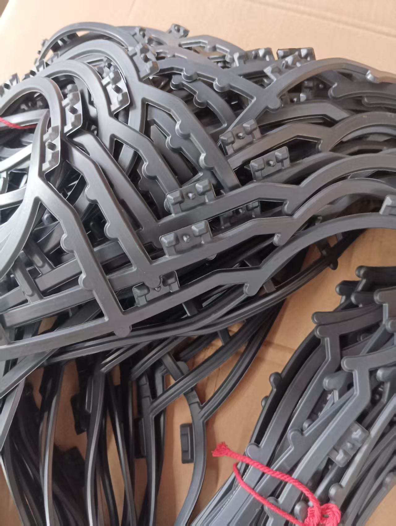 A TIVO M15-MFG compatible gasket next to an OEM one, showing a perfect match