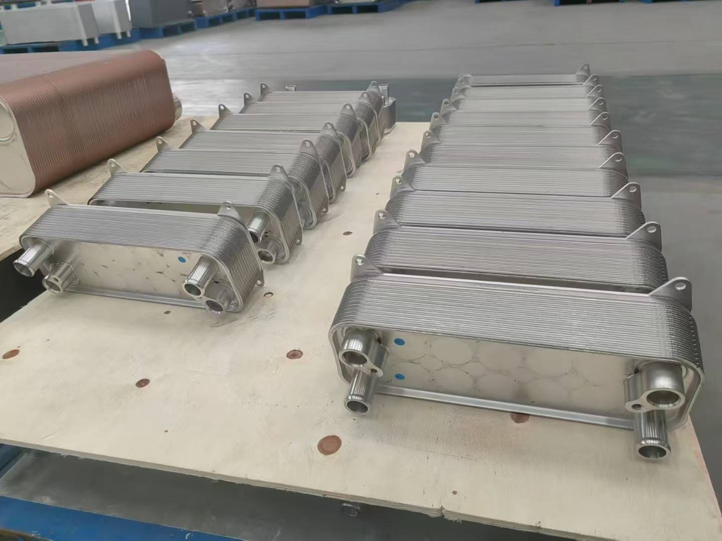 TIVO Engineer inspecting a batch of stainless steel units