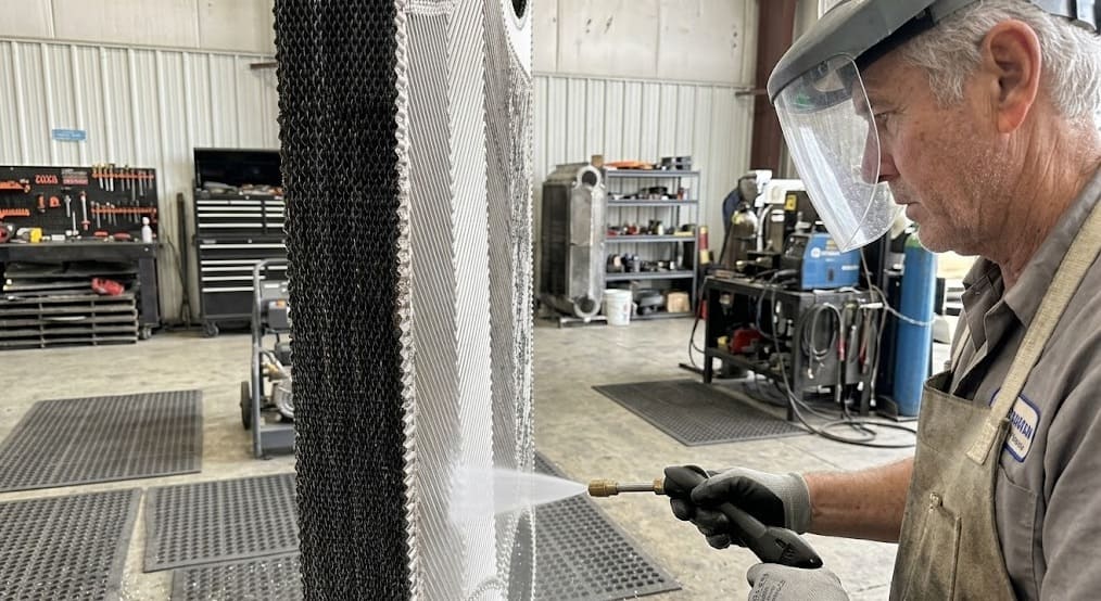 Clean heat exchanger plate before DPT